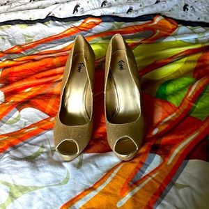 Gold small platform heels. Worn once. In good condition. Size 12.